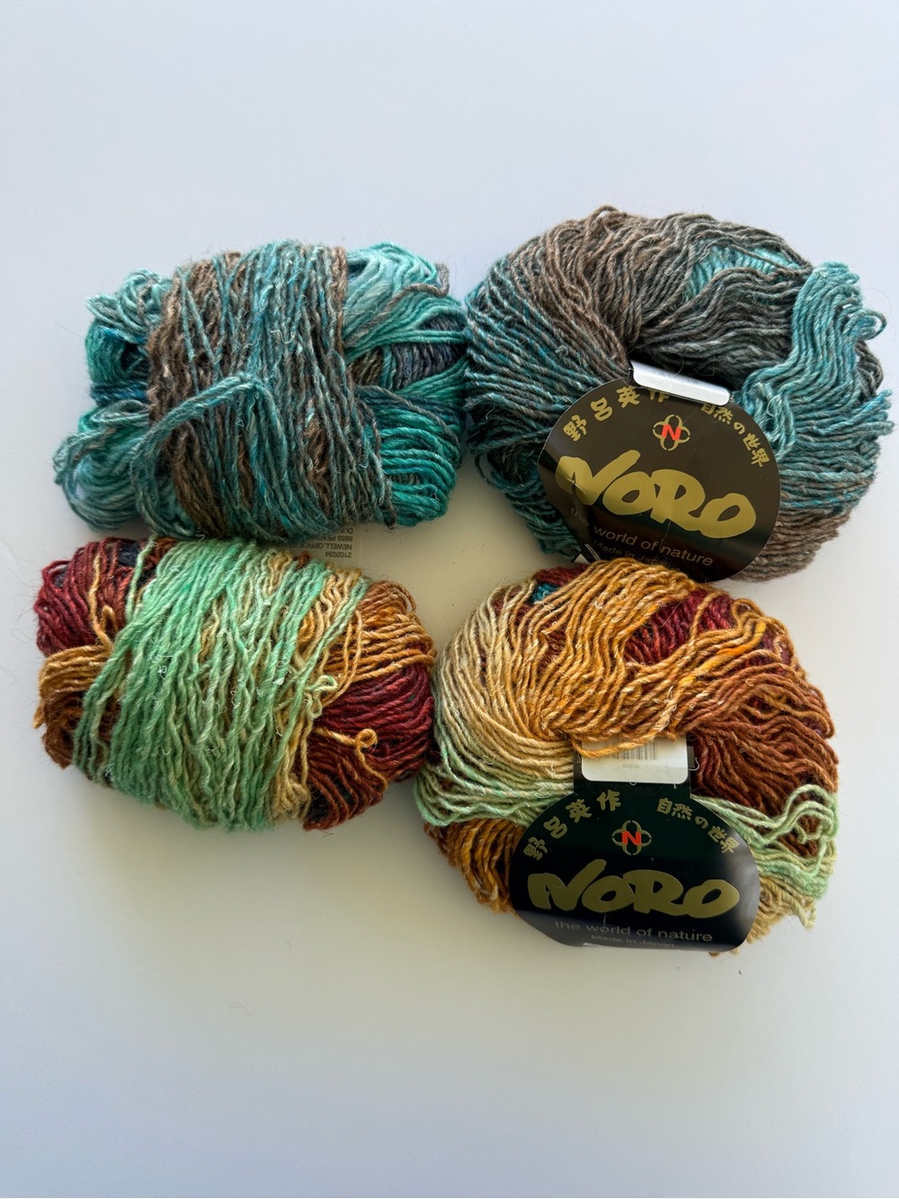 Noro Variegated Yarn Silk Garden Lite in Teal, Green, Brown, Gold, and Red